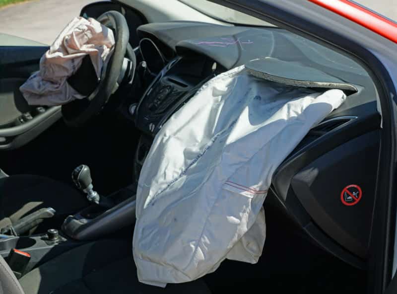 Deployed Airbag In Car
