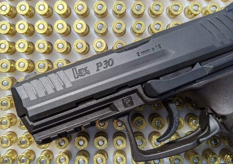 HK P30 9mm handgun and bullets