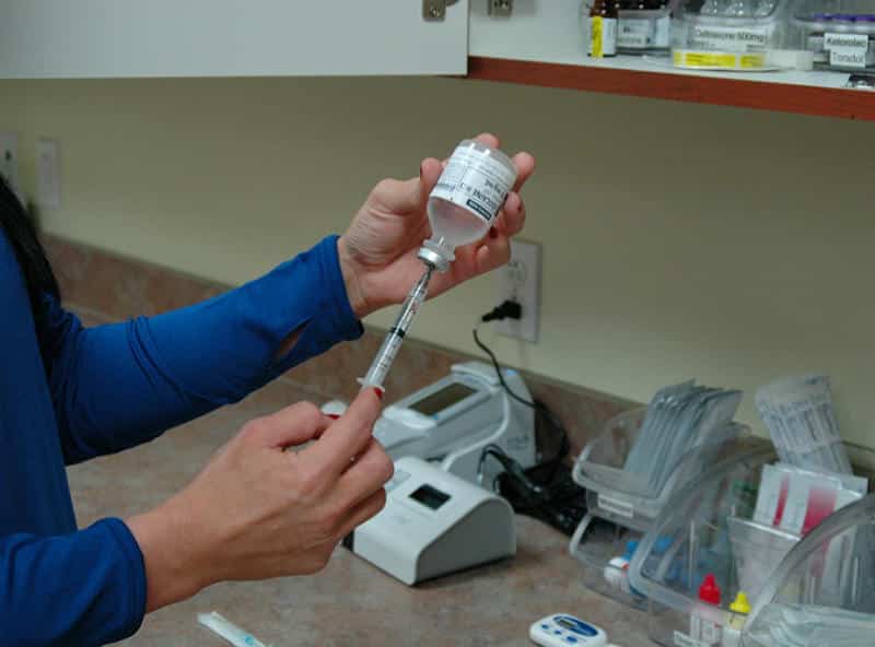 Nurse Preparing Injection